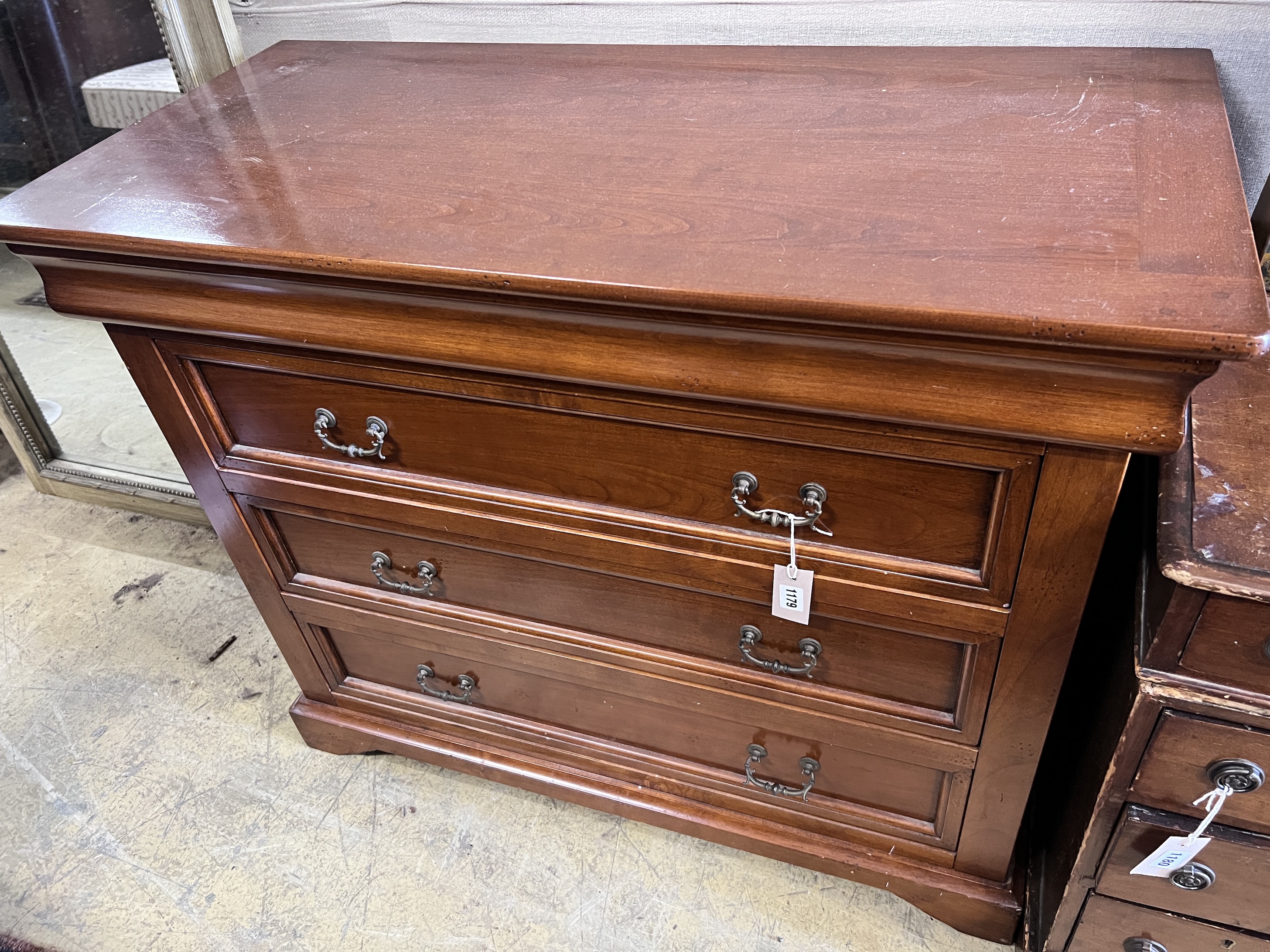 A modern French style mahogany chest of four long drawers, width 105cm